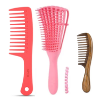 Thumbnail for Yelani Natural Hair Detangling Bundle - Orange wide-tooth detangling comb, pink flexible detangling brush, and wooden comb for 4C natural hair